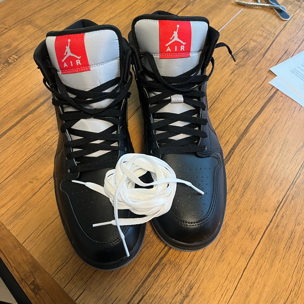 Jordan Black and White Sneakers with Red Accents